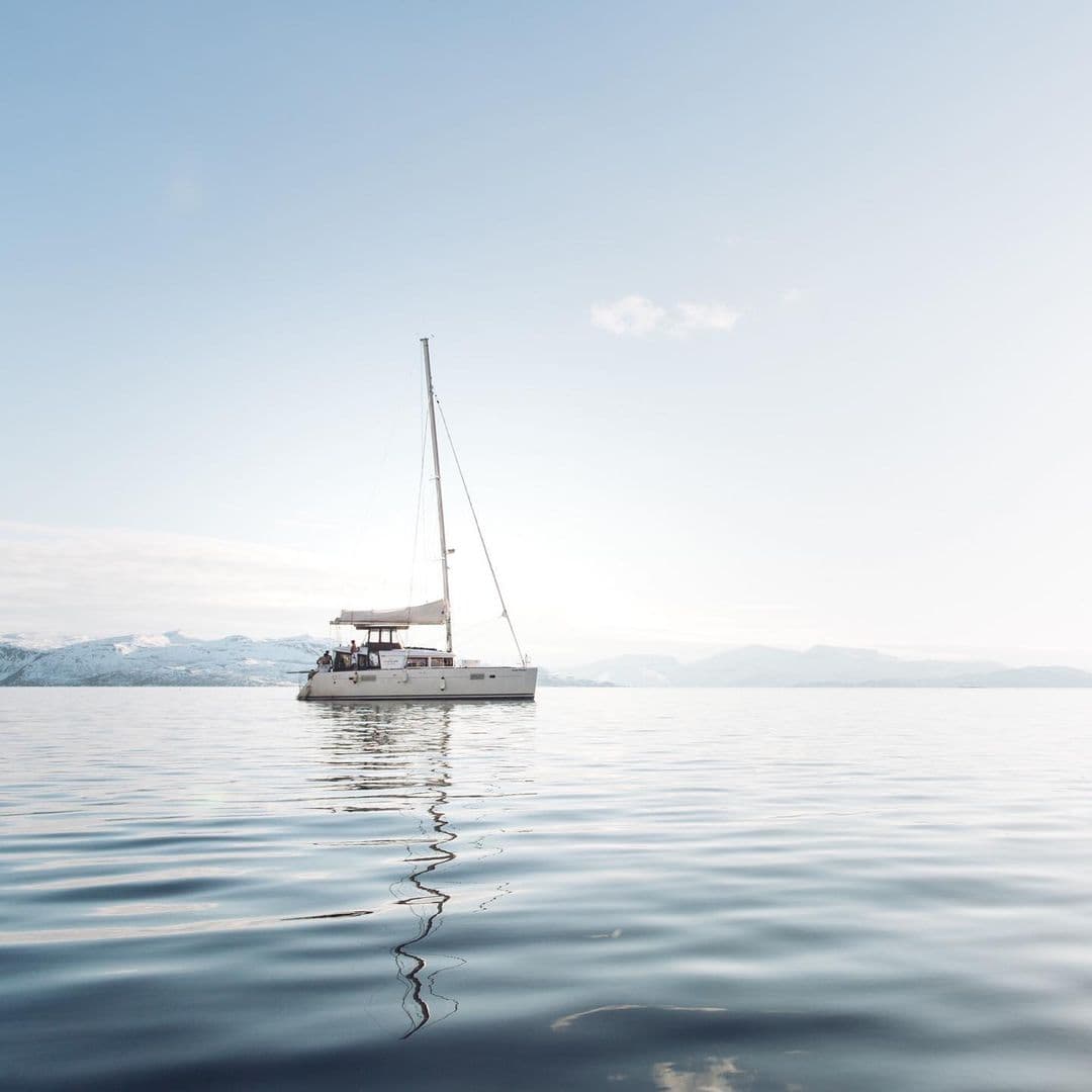 A yacht peacefully resting in the Arctic Ocean waters