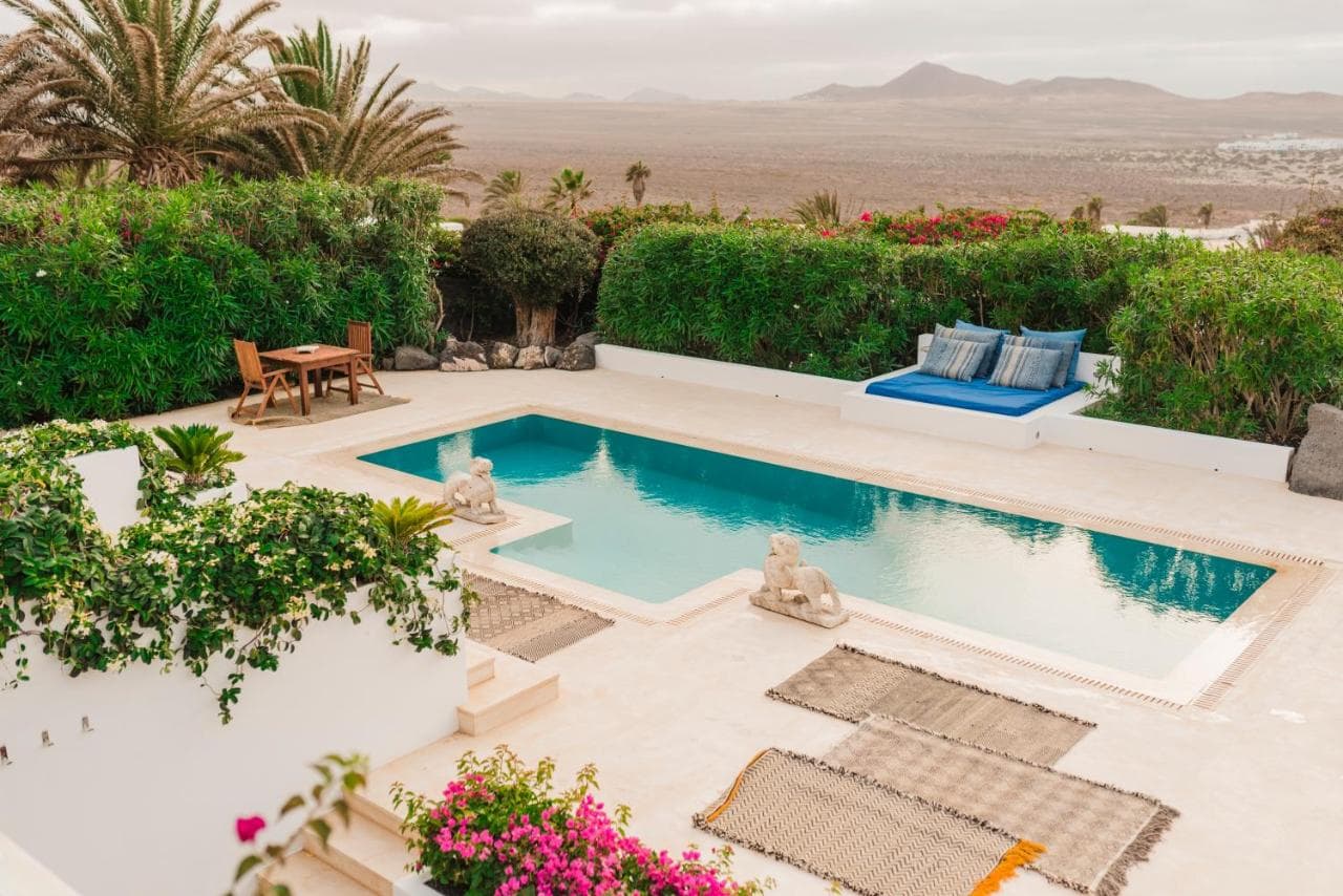 Pool with a view of the mountains of Lanzarote
