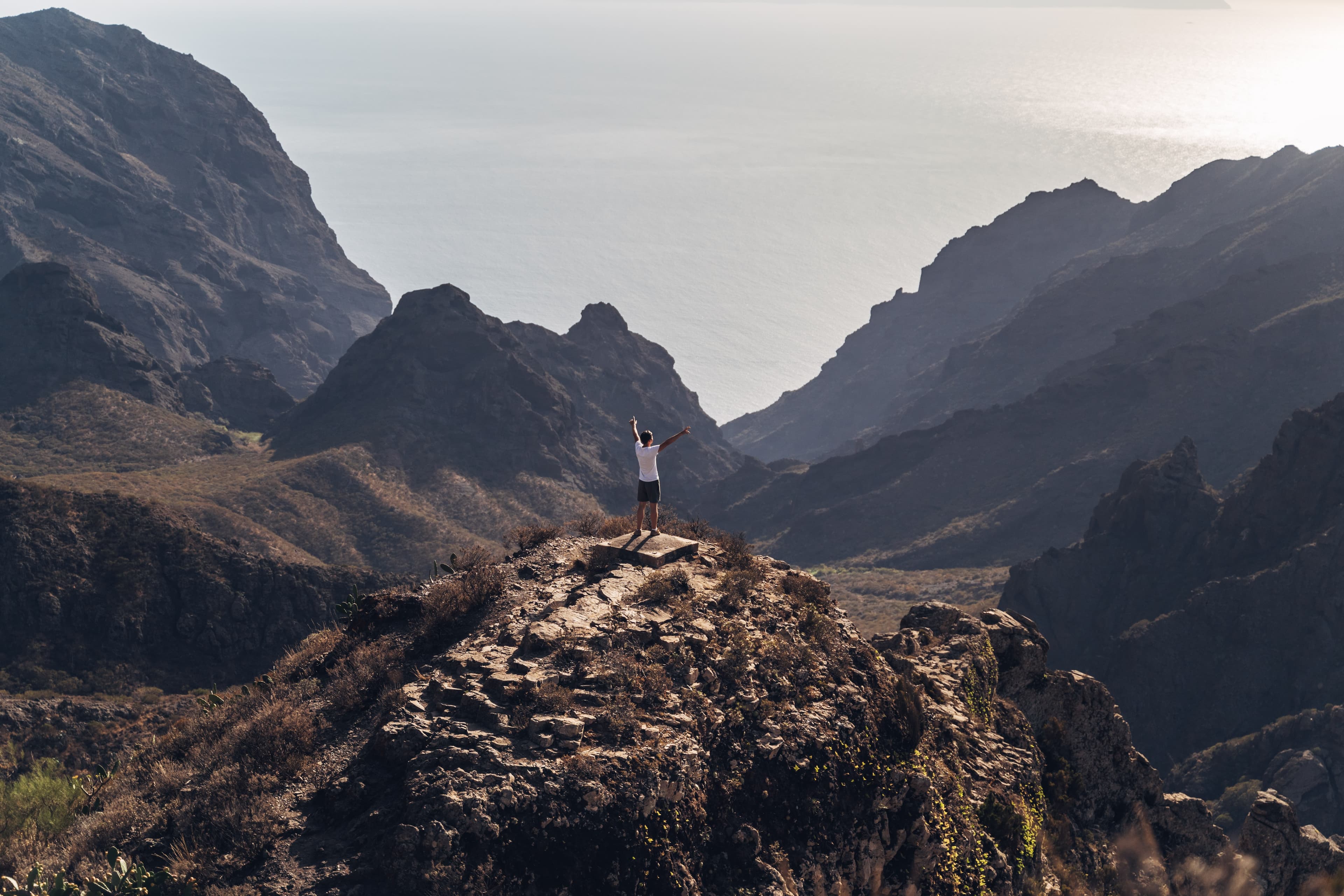 Friend of Land of Ride on top of a mountain after a hike in the Canary Islands